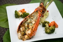 Grilled lobster tail with broccoli and carrots